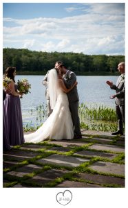 groom kisses bride