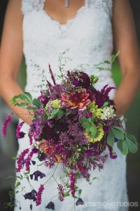 bride holds blooms