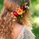 a girl with flowers in her hair